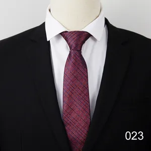 Close-up view of a professional business necktie with red and blue woven pattern texture.
