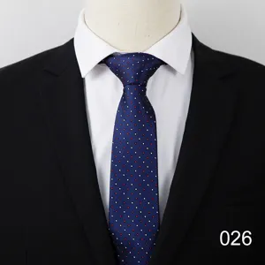 Men's business formal suit tie with classic blue and red dot pattern for office work.