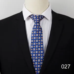 Close-up view of the blue geometric pattern men's business necktie displayed on white shirt.