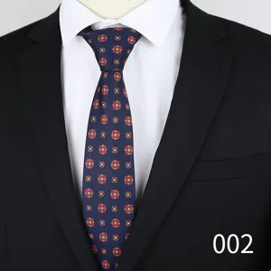Men's floral jacquard business necktie detail view, dark blue silk tie for formal wear.