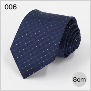 Detailed view of the 8cm navy blue business men's necktie featuring stylish blue dot woven pattern.