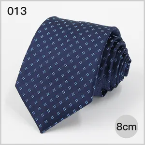 Close-up view of a classic blue men's business tie featuring a delicate small square pattern.