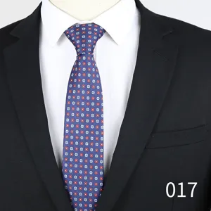 Close-up detail of a blue floral jacquard men's tie, professional suit matching accessory.