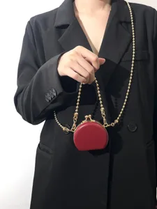 Mini ronde PU muntbeurs met kussenslot en gouden kralenkettingriem, stijlvolle crossbody tas.