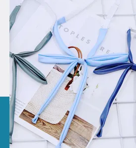 Detailed view of solid color JK uniform collar ropes, Japanese style student bow tie accessories.