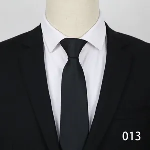 Business formal black tie detail shot, professional men suit tie for wedding work.