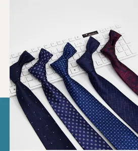 Detail view of men business formal patterned neckties assortment, premium fabric close up.