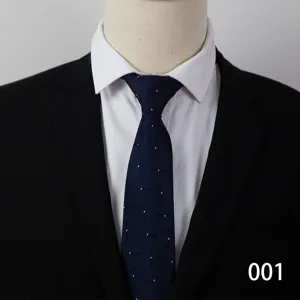 Men's classic business navy blue tie with subtle white dot pattern for formal office suits.