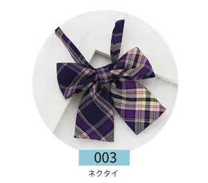 Detailed close-up of a purple plaid JK uniform bow tie, featuring elegant stripes for daily wear.