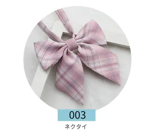 Pink plaid JK uniform bow tie detail, Japanese style pointed collar necktie accessory.