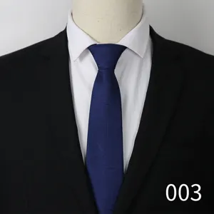 Blue tie detail shot, business formal wear display, elegant texture for men's suit matching.