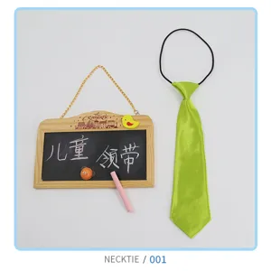 Children green necktie with elastic band, cute style accessory for boys and girls daily wear.