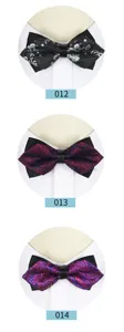 Detail view of stylish men's floral patterned bowties in multiple elegant color options.