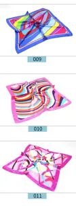 Detailed view of colorful geometric printed silk scarves, featuring vibrant abstract patterns.