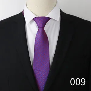 Men business purple silk patterned tie with white shirt and black suit jacket detail