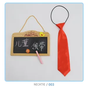 Kids red satin necktie with elastic band, cute children accessory for boys and girls daily wear detail.