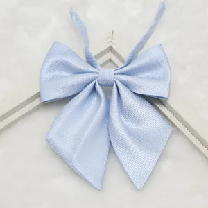 Light blue JK uniform bow tie, Japanese style school collar accessory with fine texture.