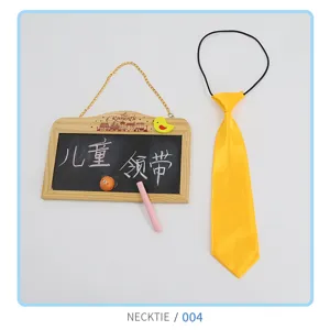 Detail shot of a bright yellow children necktie with elastic band for easy kids wear.