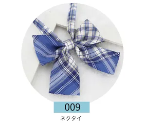Detailed close-up of a blue and white plaid JK ribbon bow tie, featuring clean stitching.