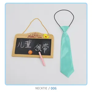 Kids blue polyester elastic necktie detail view, stylish and cute accessory for children.