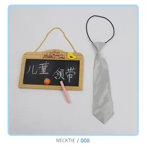 Detail view of the silver children's necktie featuring an elastic band and shiny finish.