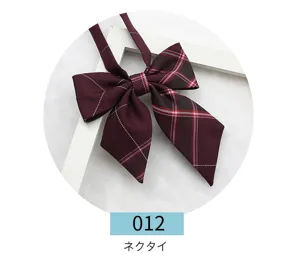 Japanese JK uniform plaid bow tie detail shot, elegant preppy style burgundy necktie.