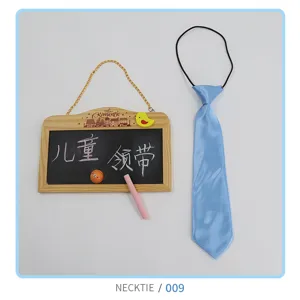 Detailed view of children blue satin necktie with elastic band for cute baby wear