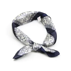 Women's 60cm silk square scarf with elegant blue and white paisley baroque pattern.