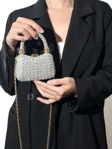Glänzende Strass-Abendtasche mit goldener Kette, elegante Clutch für Partys und Anlässe.
