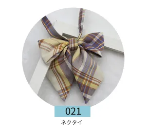 Detailed view of the plaid bow tie detail, featuring classic Japanese JK style design.