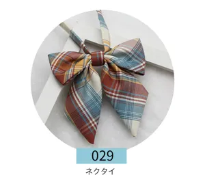 Detailed view of the Japanese style plaid JK uniform bow tie, showing fabric texture and shape.