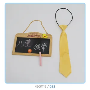 Kids yellow necktie with elastic band, cute baby fashion accessory for party and daily wear.