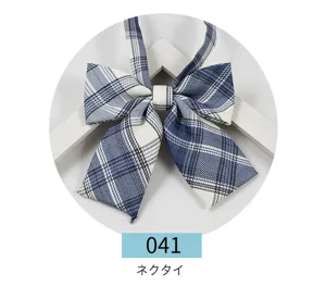 Detail shot of Japanese JK style blue and white plaid bow tie, featuring classic striped pattern.