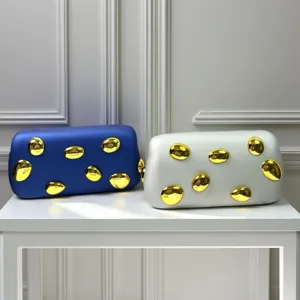Chicke Acryl Clutch Tasche mit goldenen Tropfen Akzenten, vielseitige Umhängetasche.