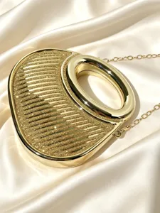 Goldene Abendtasche mit starrem Metallgriff und Glitzertextur für elegante Damen.