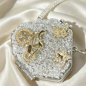 Stunning crystal evening clutch bag featuring a dazzling rhinestone bicycle design on satin.