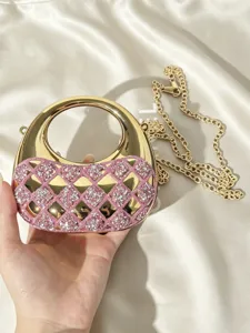 Goldene Acryl Abendtasche Detail, rosa Strass Diamant Schulterketten Tasche glänzend.