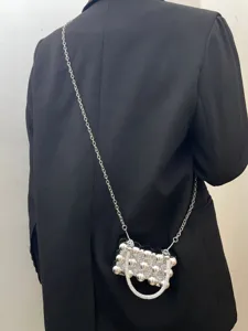 Acrylic beaded mini evening bag detail, sparkling rhinestones and silver chain strap.