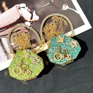Mini rhinestone evening bag with chain, sparkling crystal acrylic clutch purse for party dress.