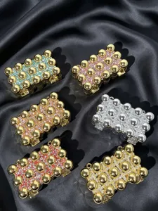 Stylish acrylic evening clutch bag set with sparkling rhinestones and gold dome studs for women.