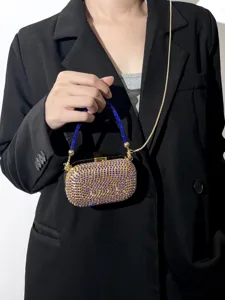 Elegante Strass-Clutch Tasche mit blauen und goldenen Kristallen für stilvolle Damen