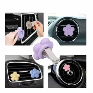 Silicone car air vent flower aromatherapy clip, cute floral design interior decor scent.