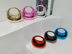 Glänzende Acryl Mini Henkeltasche Umhängetasche, stilvolle metallische ovale Handtasche Damen.
