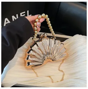 Stylish glossy shell acrylic evening clutch bag with beaded handle and metal chain strap.