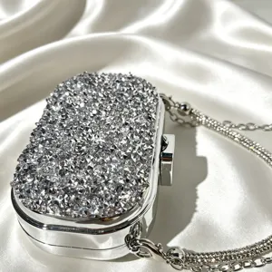 Stunning silver rhinestone evening clutch bag with metallic chain, luxury party shoulder bag.