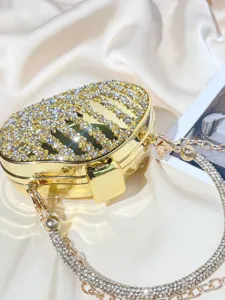 Exquisite detail of rhinestone acrylic mini box bag, sparkling crystal chain strap.