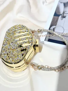 Exquisite gold rhinestone mini box bag with sparkling crystals and chic chain strap.