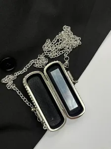 Mini rhinestone metal box crossbody bag with chain strap and interior mirror for women.