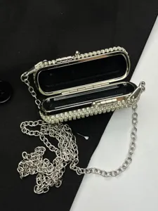 Mini rhinestone box bag detail view, silver chain strap, evening clutch for women.