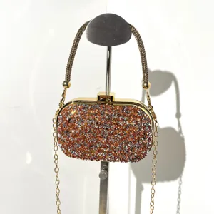 Sparkling rhinestone evening clutch bag with chain strap, luxury style for party women.
